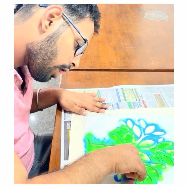 A student painting during a session at Discover Ability